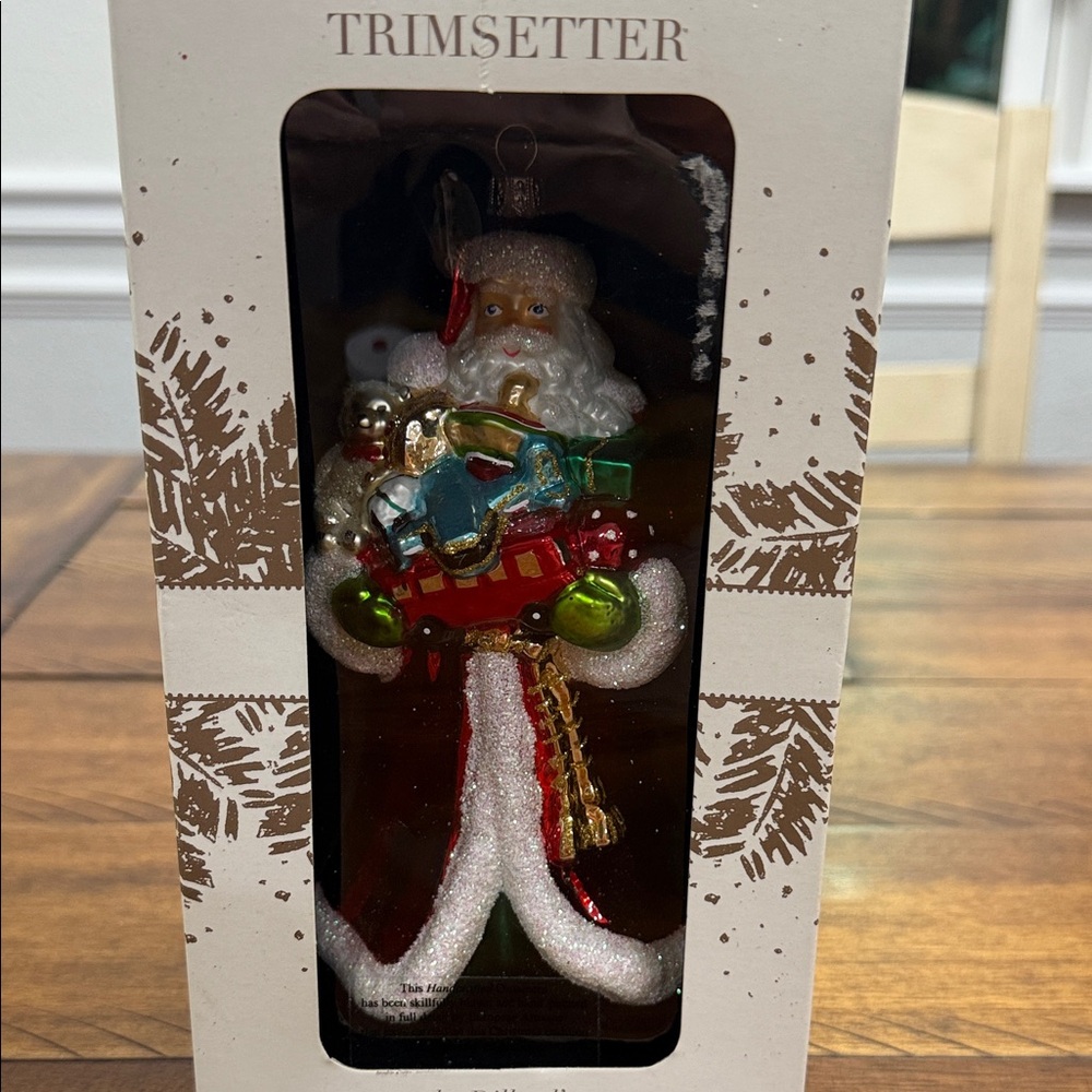 Santa Claus Ornament holding toys- Festive Red and Green